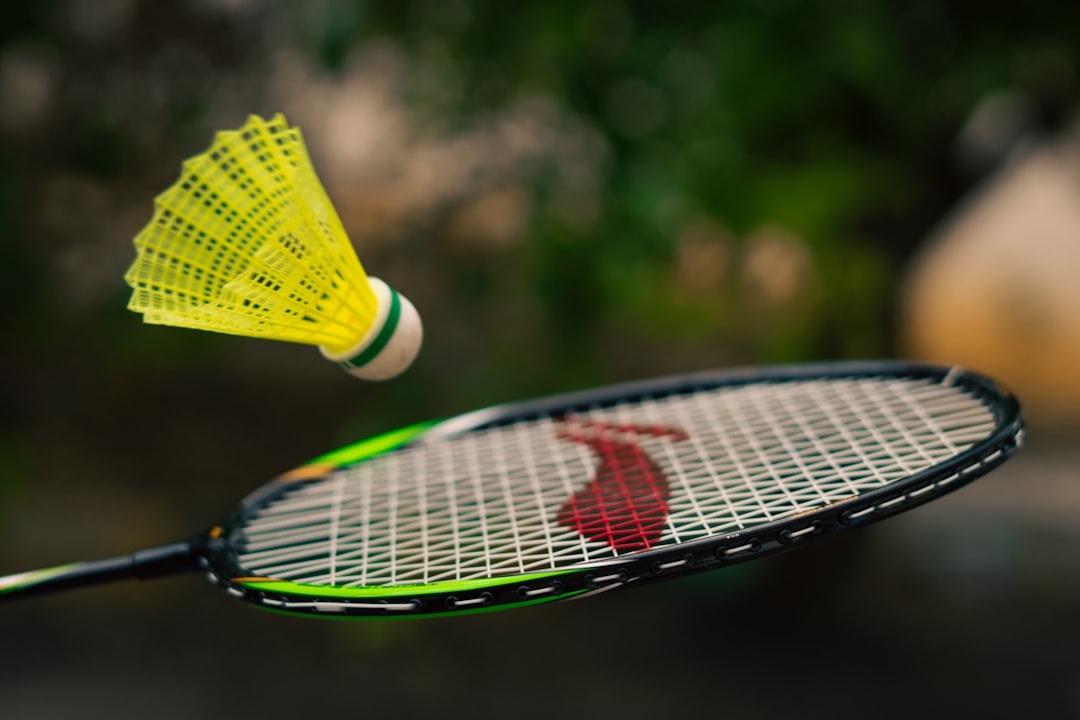 our-services-01 a-close-up-of-a-tennis-racquet-with-a-person-on-it-gstjreyyjwc